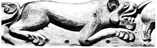 Барс — деталь резного украшения деревянной основы колчана из женского погребения.