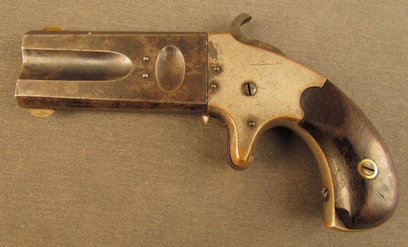 Двуствольный пистолет компании Американ Армс (American Arms Double Barrel Derringer) и его разновидности