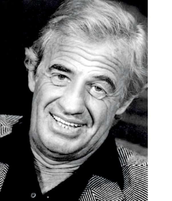 Жан-Поль Бельмондо. Кадр сделан во время пресс-конференции по договоренности с актером, поскольку он не имел права позировать для портретных съемок по условиям контракта Жан-Поль Бельмондо. Кадр сделан во время пресс-конференции по договоренности с актером, поскольку он не имел права позировать для портретных съемок по условиям контракта