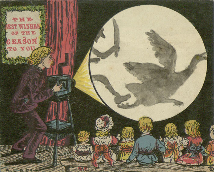 Дети просматривают страшный фильм на стене. Дети просматривают страшный фильм на стене.