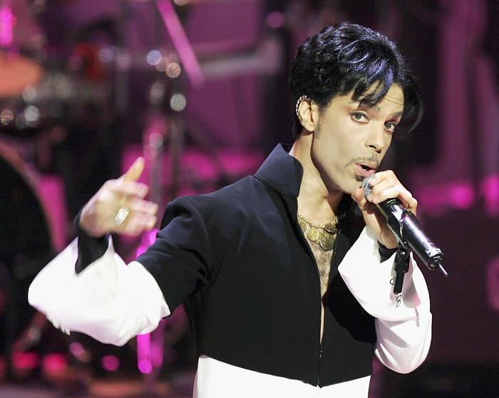 Принс (Prince) - американский музыкант, певец, выдающийся гитарист. | Фото: whio.com. Принс (Prince) - американский музыкант, певец, выдающийся гитарист. | Фото: whio.com.
