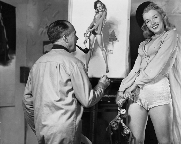 Эрл Моран (Earl Moran) рисует пин-ап-плакат с изображением Мэрилин Монро. | Фото: messynessychic.com. Эрл Моран (Earl Moran) рисует пин-ап-плакат с изображением Мэрилин Монро. | Фото: messynessychic.com.