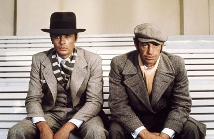 Ален Делон и Жан-Поль Бельмондо в фильме *Борсалино*, 1970 | Фото: gorod.tomsk.ru Ален Делон и Жан-Поль Бельмондо в фильме *Борсалино*, 1970 | Фото: gorod.tomsk.ru