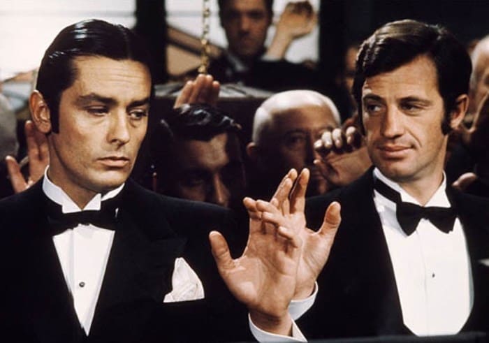 Ален Делон и Жан-Поль Бельмондо в фильме *Борсалино*, 1970 | Фото: gorod.tomsk.ru Ален Делон и Жан-Поль Бельмондо в фильме *Борсалино*, 1970 | Фото: gorod.tomsk.ru
