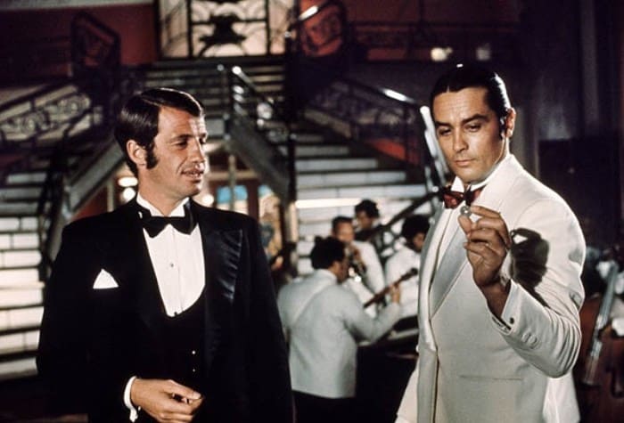 Жан-Поль Бельмондо и Ален Делон в фильме *Борсалино*, 1970 | Фото: gorod.tomsk.ru Жан-Поль Бельмондо и Ален Делон в фильме *Борсалино*, 1970 | Фото: gorod.tomsk.ru