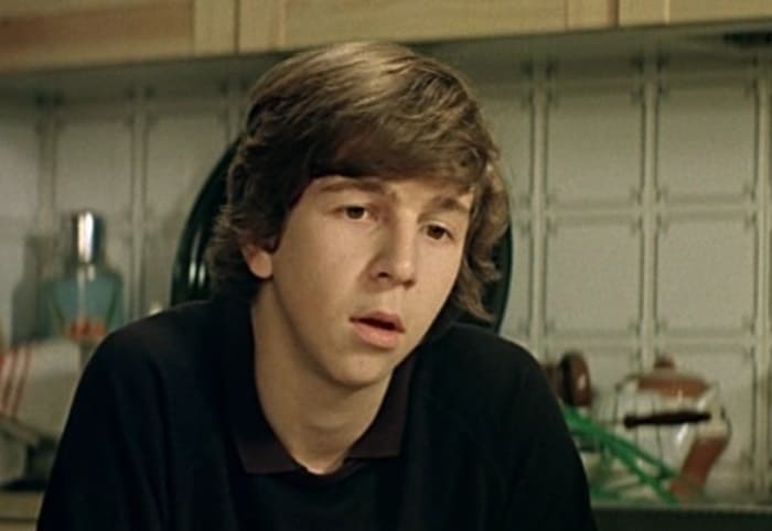 Федор Дунаевский в фильме *Курьер*, 1986 | Фото: kino-teatr.ru Федор Дунаевский в фильме *Курьер*, 1986 | Фото: kino-teatr.ru